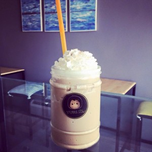 Light Mocha Frappe with whipped cream on top.